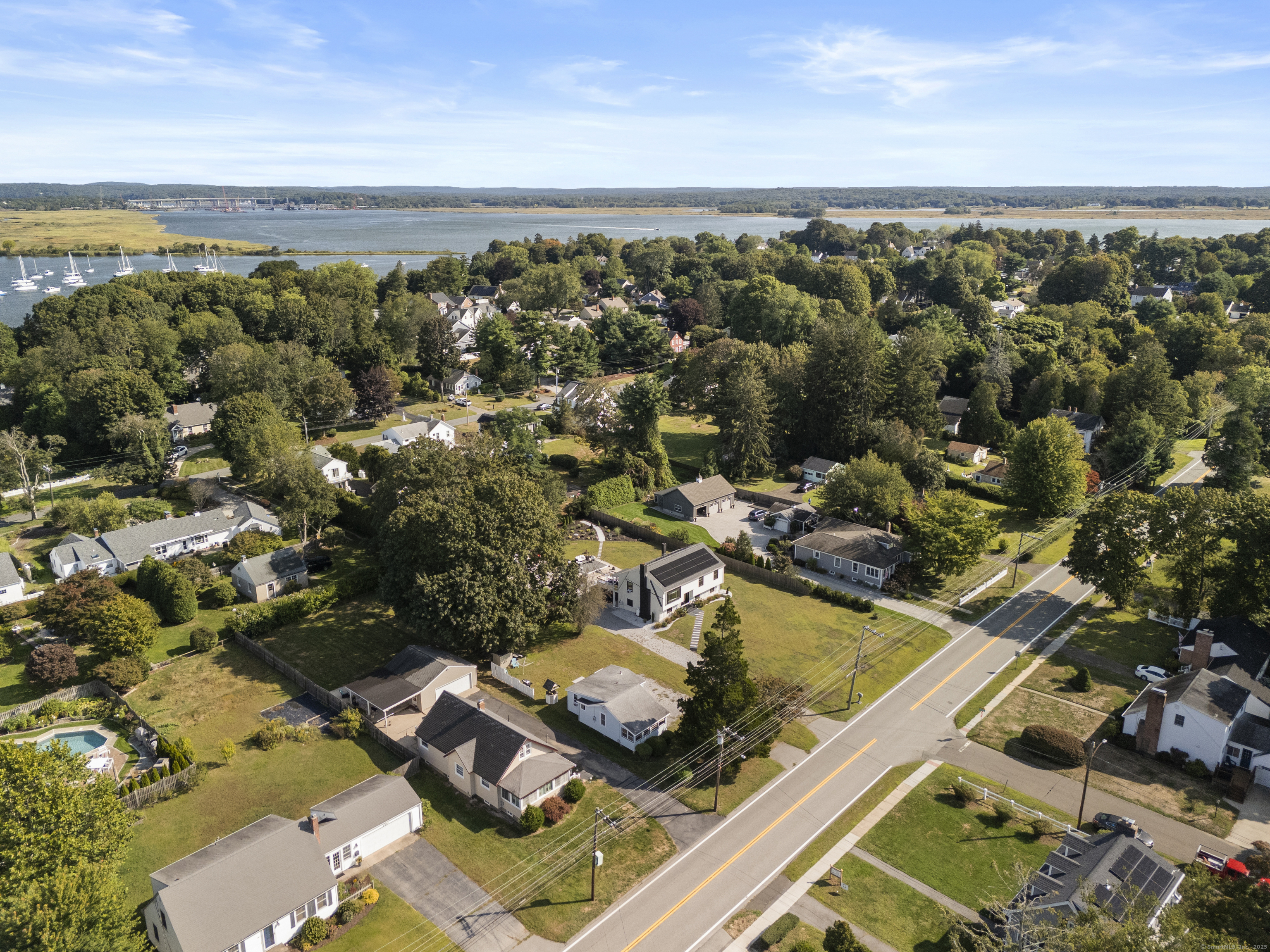 13 College Street Old Saybrook, CT 06475 - Photo 21 of 23 an aerial view of a house with a ocean view