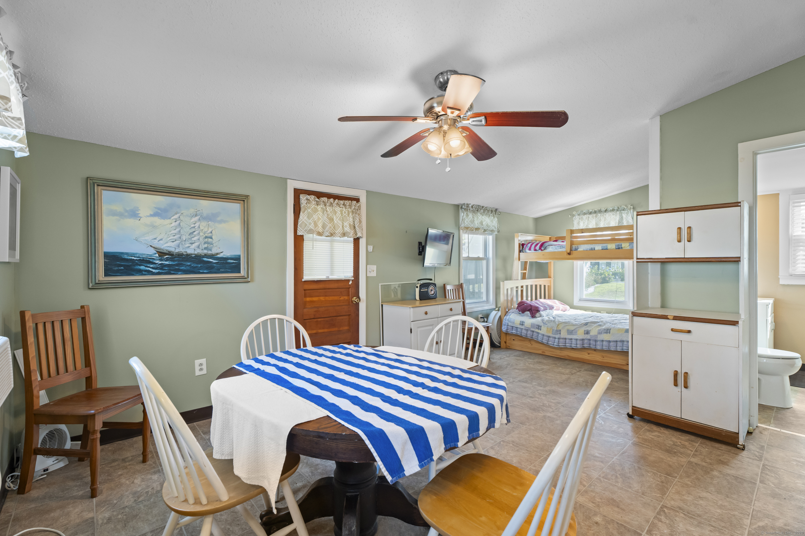 13 College Street Old Saybrook, CT 06475 - Photo 9 of 23 a view of a dining room with furniture