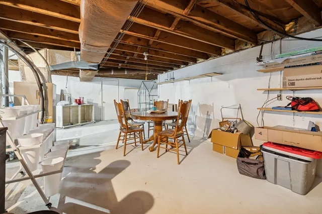 a view of a storage room with furniture