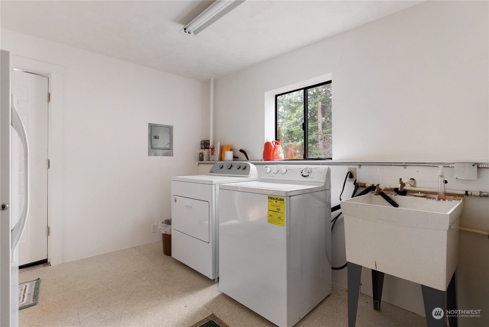4768 Sharpe Road Anacortes, WA 98221 - Photo 21 of 37 a utility room with sink dryer and washer