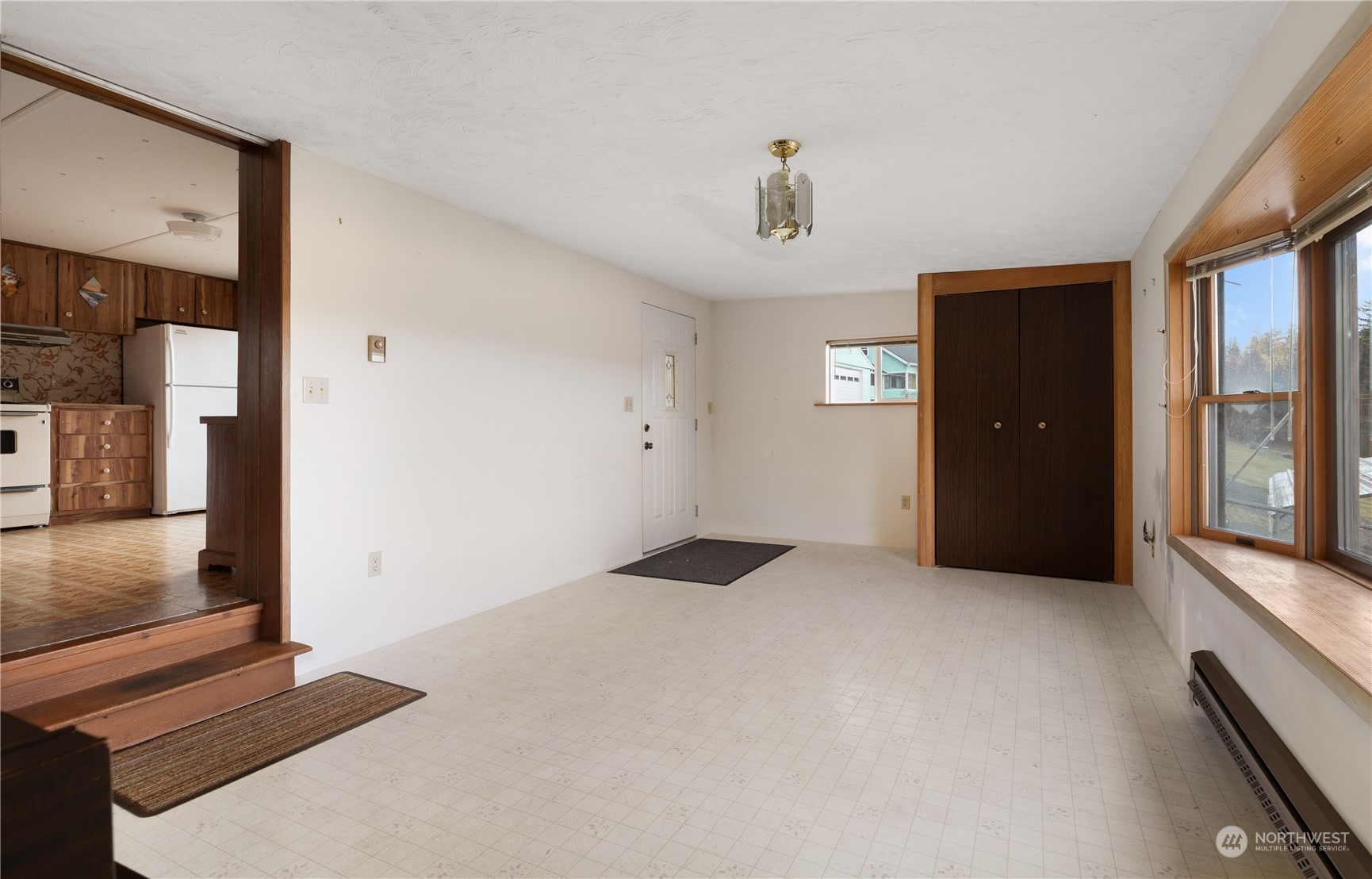 4768 Sharpe Road Anacortes, WA 98221 - Photo 3 of 37 a view of an empty room with window