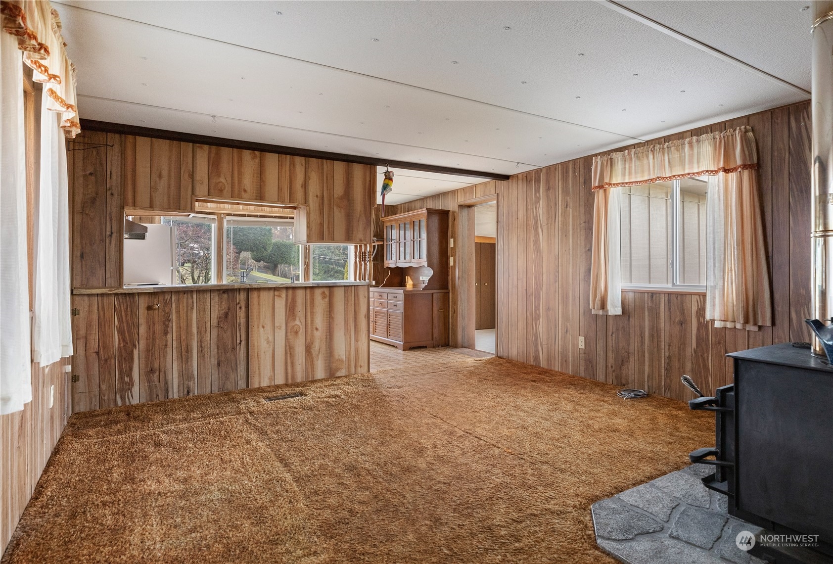 4768 Sharpe Road Anacortes, WA 98221 - Photo 9 of 37 an empty room with windows