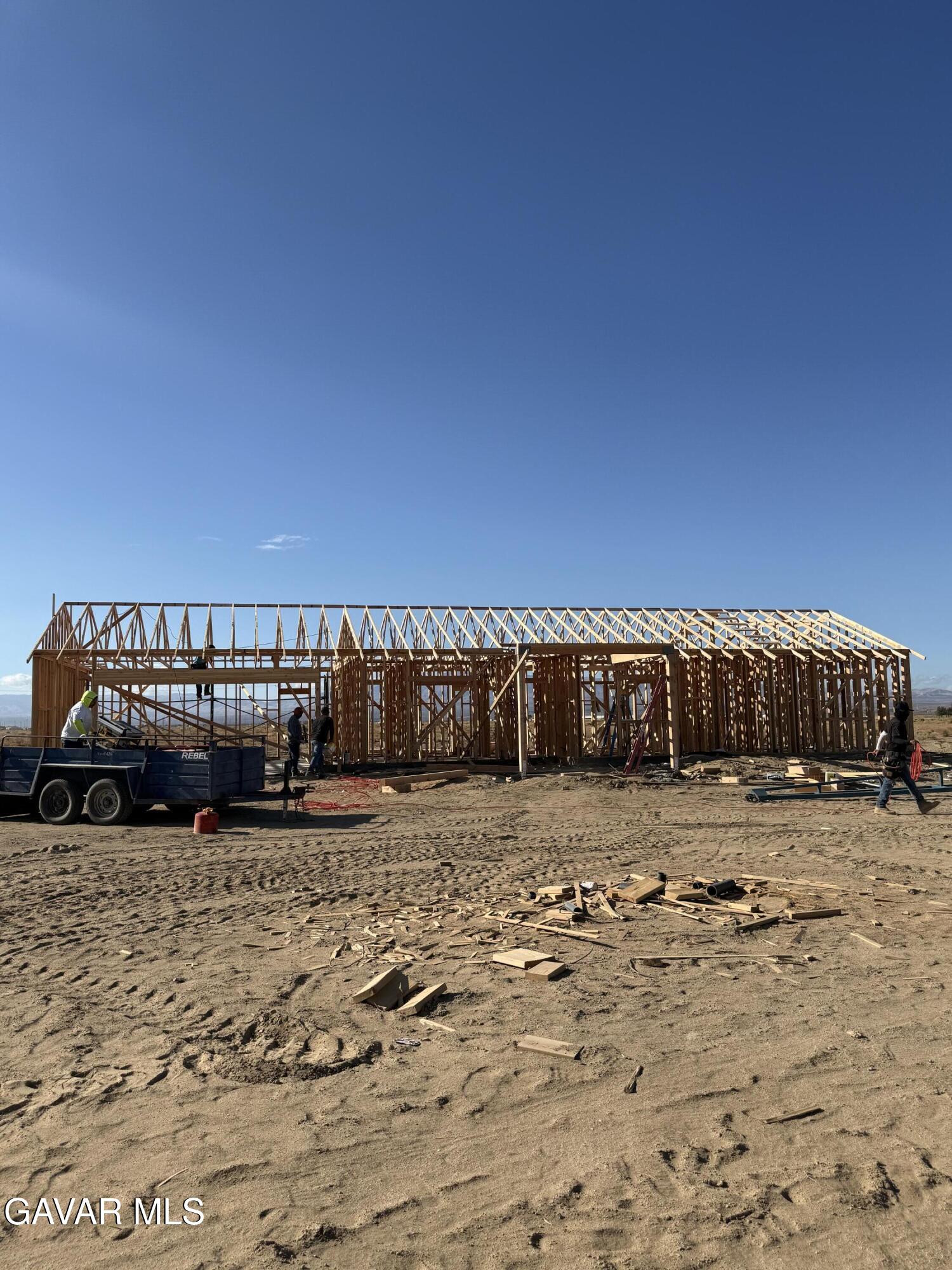 50967 Spring Valley Road Lancaster, CA 93536 - Photo 3 of 11 a view of a parking space with wooden fence