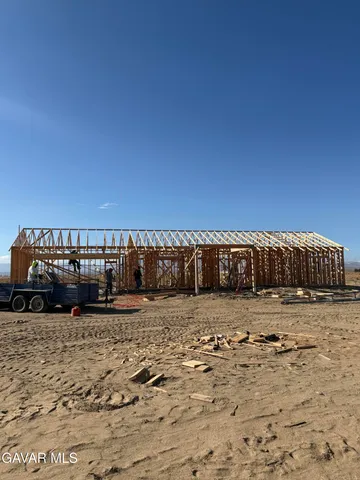 a view of a parking space in a yard