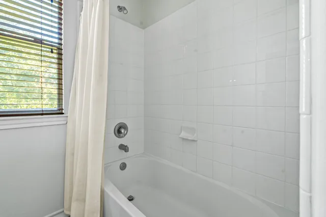 a bathroom with a bathtub