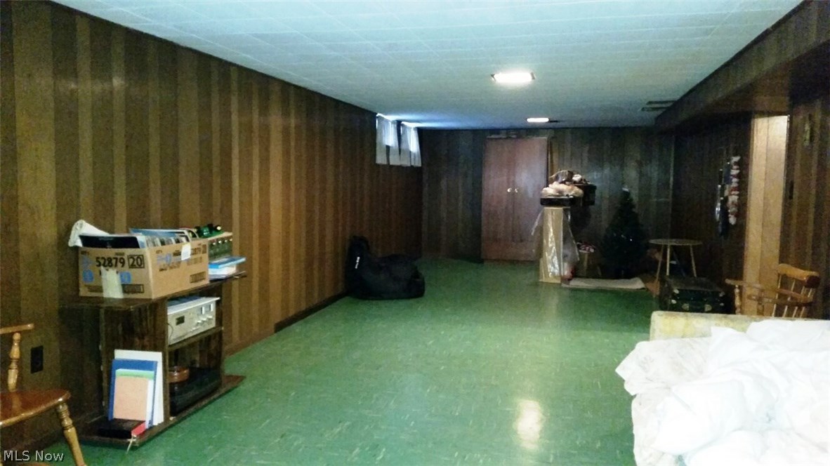 13271 McCracken Road Cleveland, OH 44125 - Photo 20 of 24 the basement rec room is perfect for games, fun and Superbowl parties!