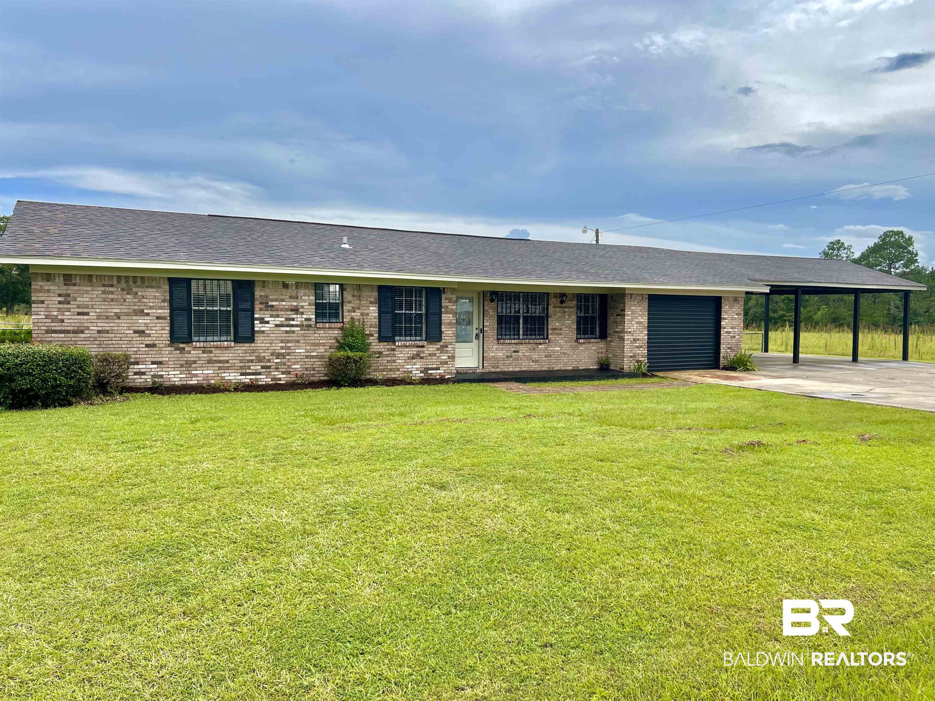 508 Freemanville Drive Atmore, AL 36502 - Photo 4 of 27 Single story home with a front yard
