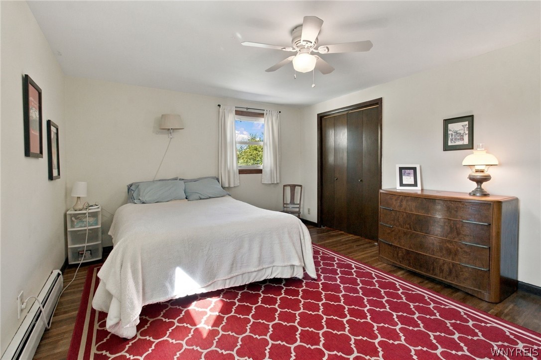 123 Ranch Trail West Amherst, NY 14221 - Photo 22 of 38 Gleaming hardwood floors and a spacious closet define this comfortable bedroom space.