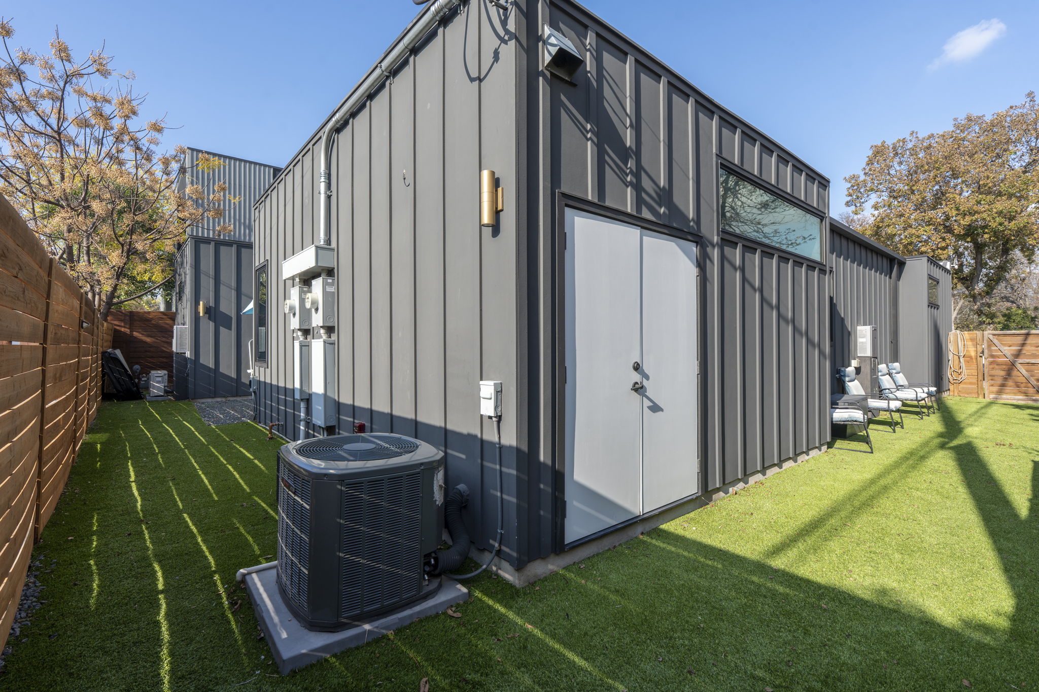7525 Delafield Lane, Unit B Austin, TX 78752 - Photo 26 of 37 a backyard of a house with seating space