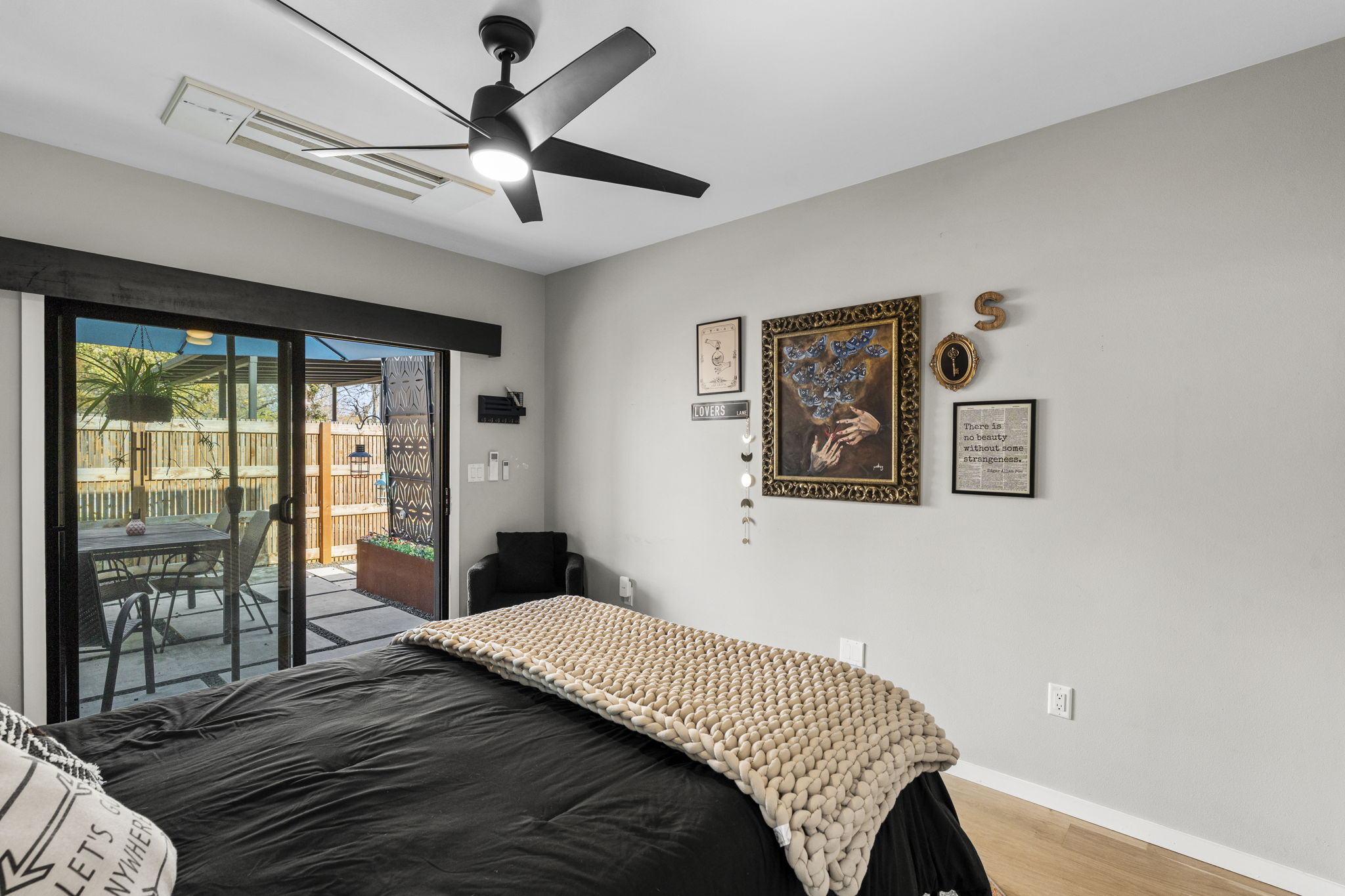 7525 Delafield Lane, Unit B Austin, TX 78752 - Photo 33 of 37 a bedroom with a large bed and a window