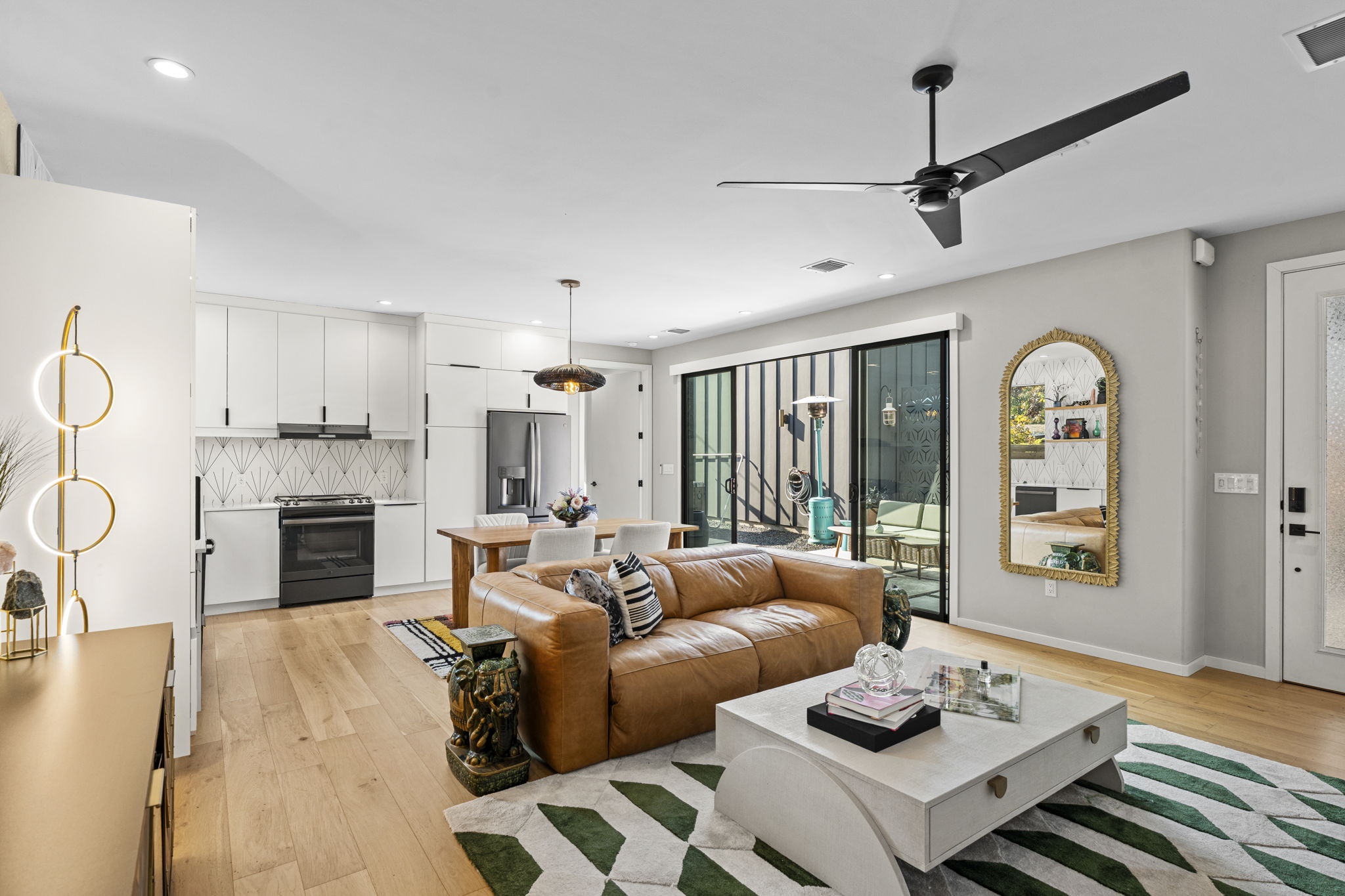 7525 Delafield Lane, Unit B Austin, TX 78752 - Photo 10 of 37 a living room with furniture fireplace and dining table