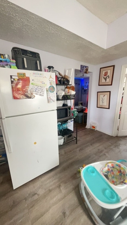 34 Beacon Street, Unit 1L Worcester, MA 01608 - Photo 5 of 9 a utility room with washer and dryer