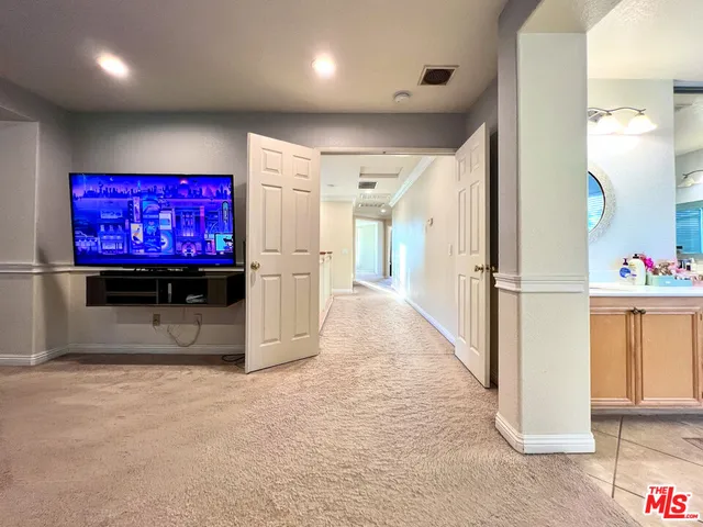a view of livingroom with furniture and stairs