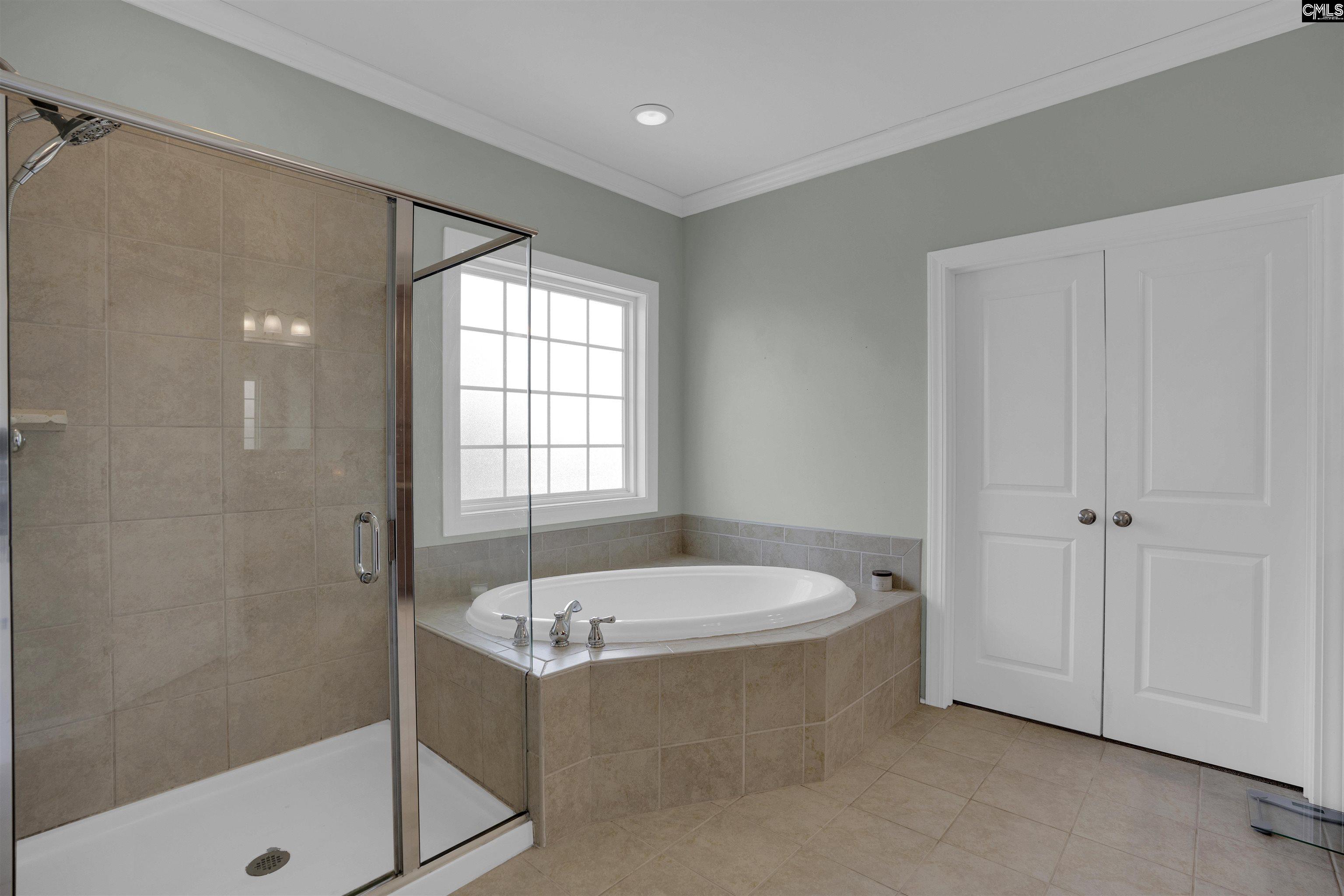 321 Asa Rose Lexington, SC 29072 - Photo 27 of 52 a bathroom with a sink and a bathtub