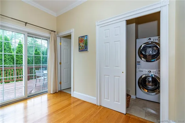 a view of a hallway with washer and dryer