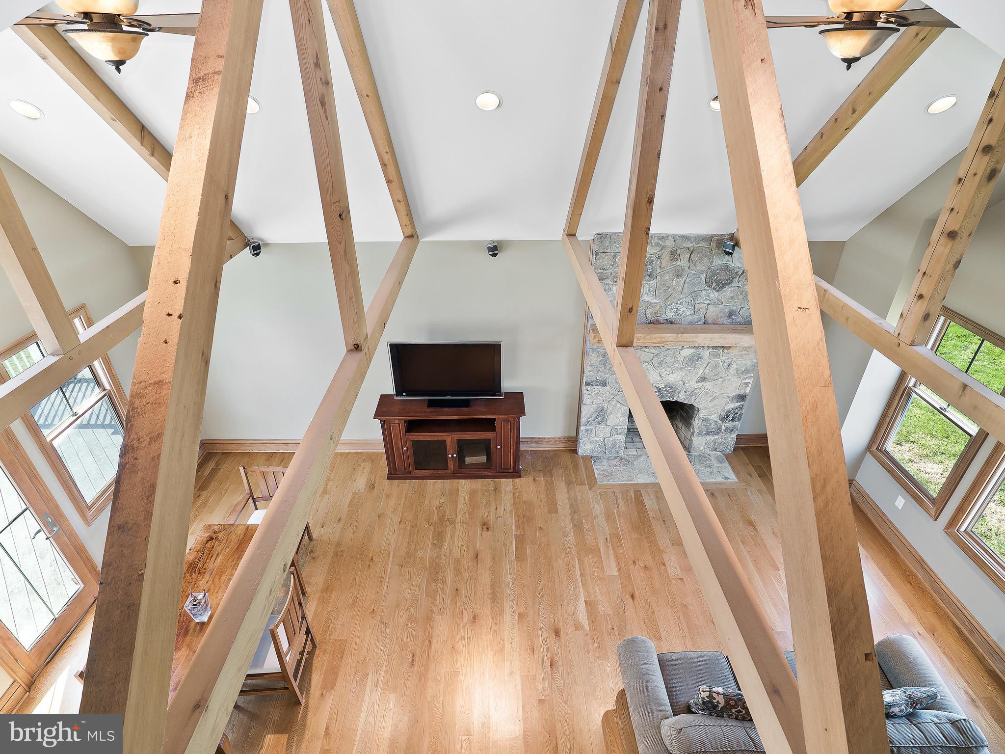 36340 Paxson Road Purcellville, VA 20132 - Photo 15 of 43 Enjoy the fireplace from the balcony in the Master
