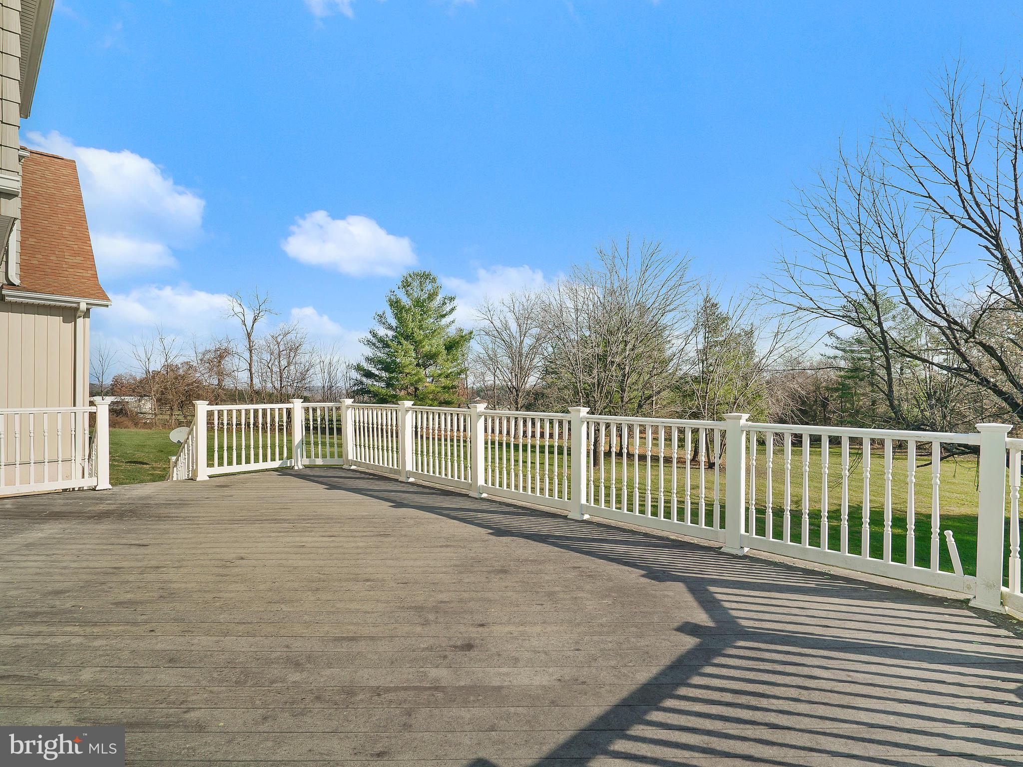 36340 Paxson Road Purcellville, VA 20132 - Photo 38 of 43 Huge deck overlooking the yard...or your horses!