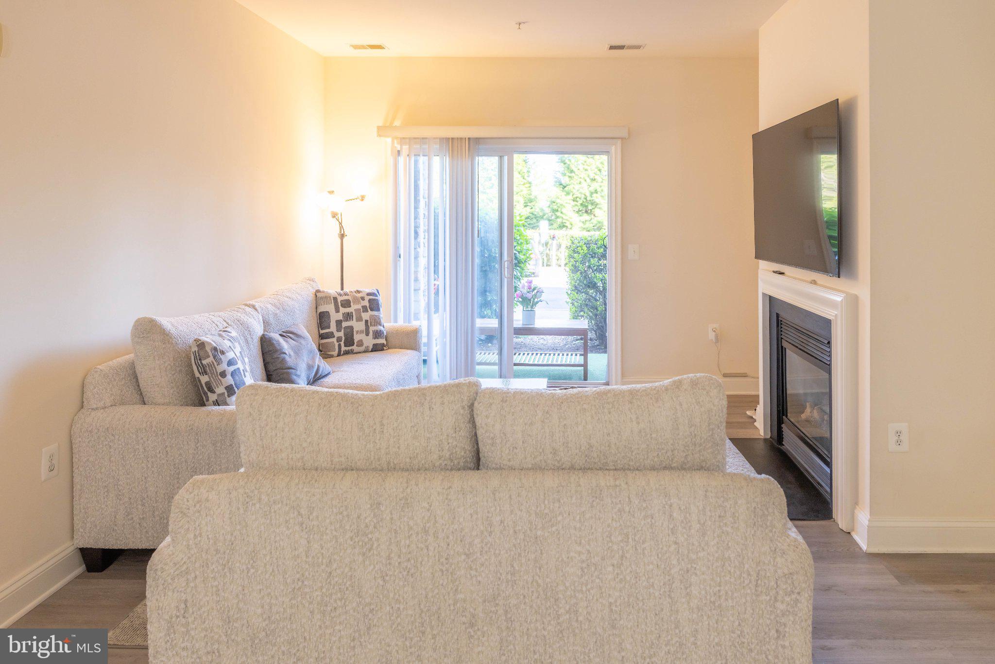 12824 Clarksburg Square Road, Unit 105 Clarksburg, MD 20871 - Photo 23 of 96 Bright and inviting living space.