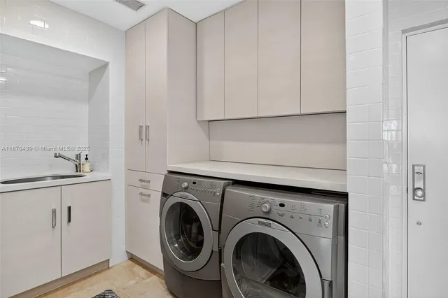 a bathroom with a sink mirror vanity and toilet