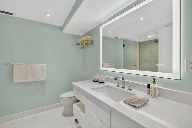 a view of a living room and balcony