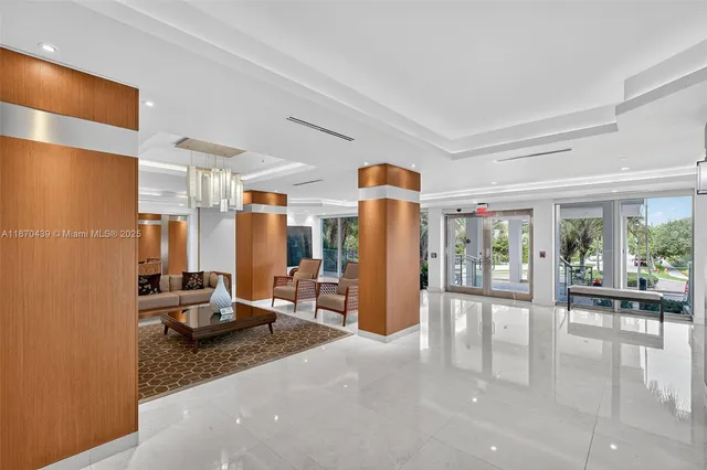 a view of a chair and table in the backyard