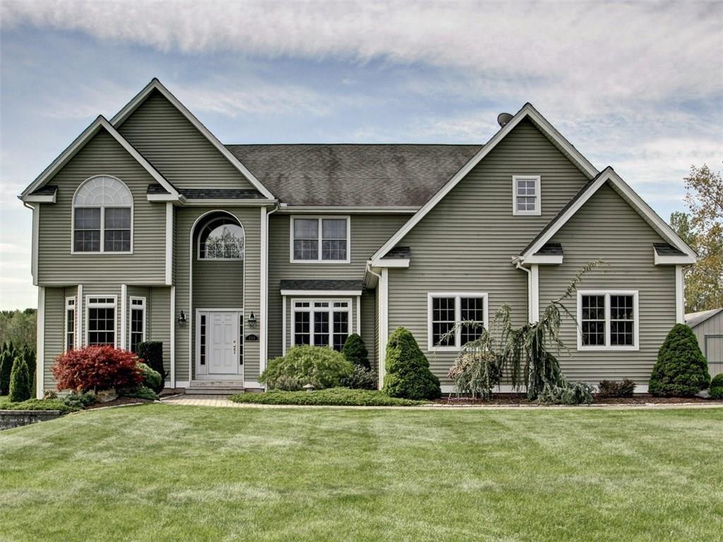 590 Norton Road Berlin, CT 06037 - Photo 1 of 1 a front view of a house with a yard