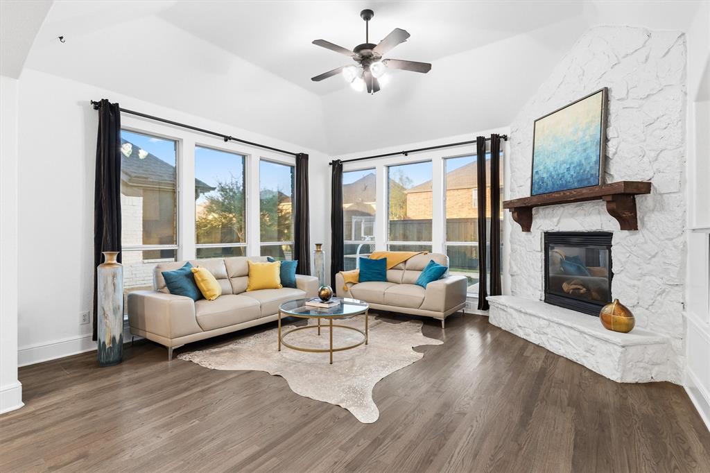 810 Summerfield Prosper, TX 75078 - Photo 13 of 19 a living room with furniture and a fireplace