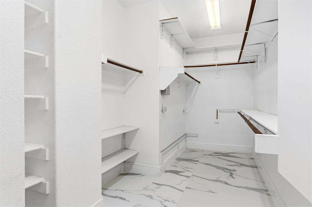 810 Summerfield Prosper, TX 75078 - Photo 17 of 19 a view of an empty walk in closet