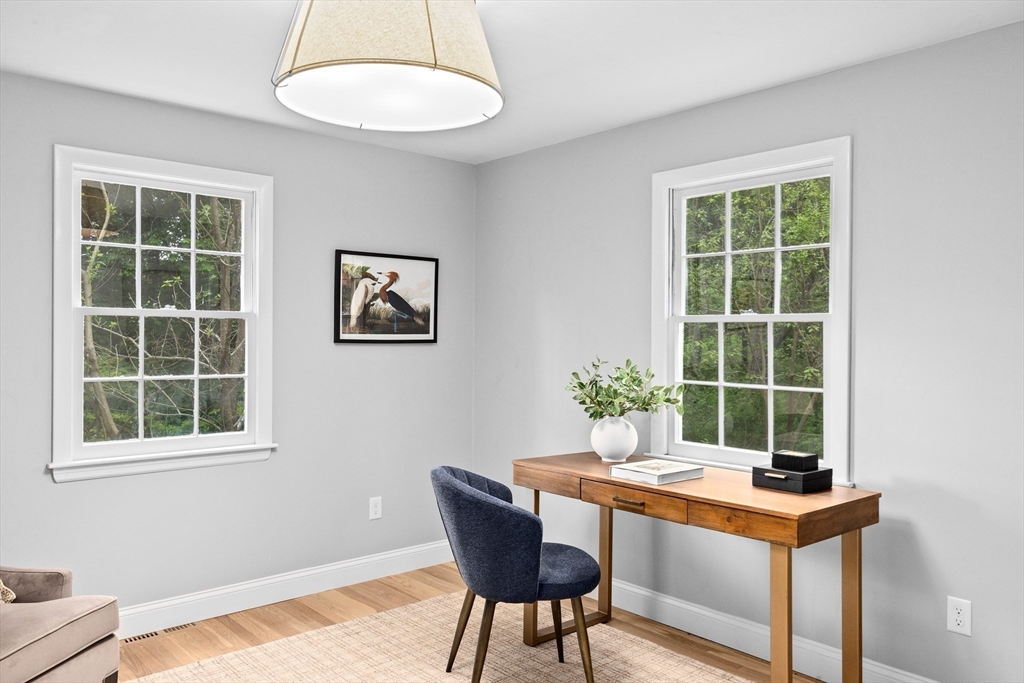 14 Spring Street Hingham, MA 02043 - Photo 15 of 28 a room with a window and a table