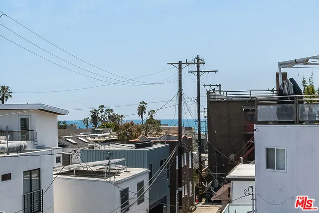 a kitchen with a stove and cabinets