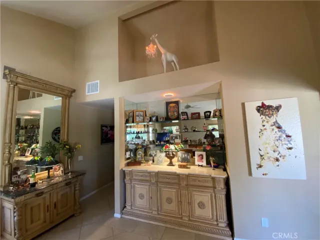 a view of living room and workspace