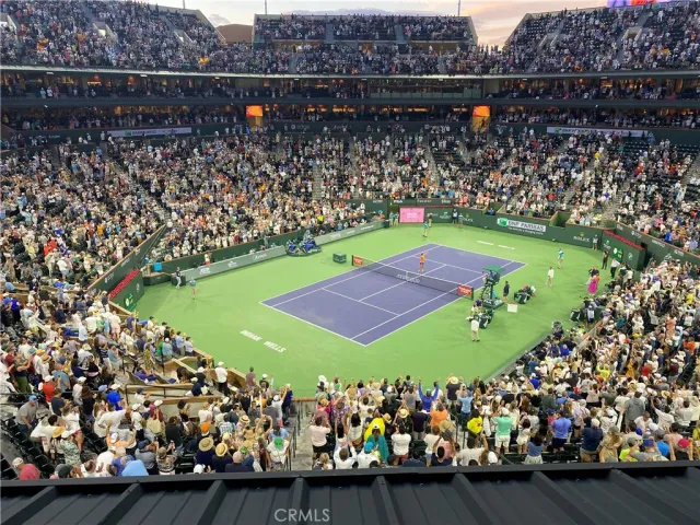 an aerial view of a chairs and table