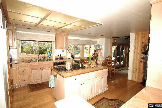 1820 Wendy Way Reno, NV 89509 - Photo 8 of 8 a kitchen with sink stove and refrigerator