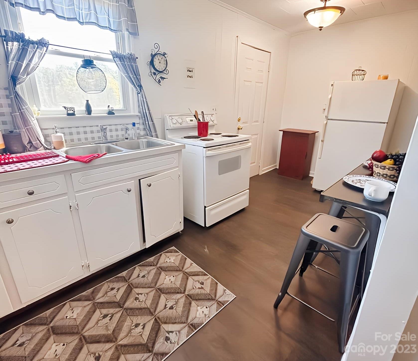 556 6th Street Chester, SC 29706 - Photo 4 of 10 a room with storage and utility