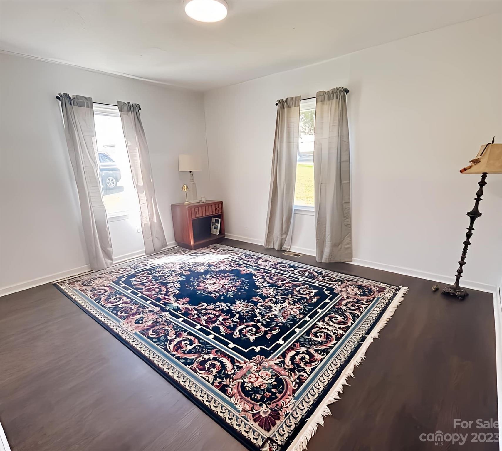 556 6th Street Chester, SC 29706 - Photo 10 of 10 a bedroom with wooden floor and window