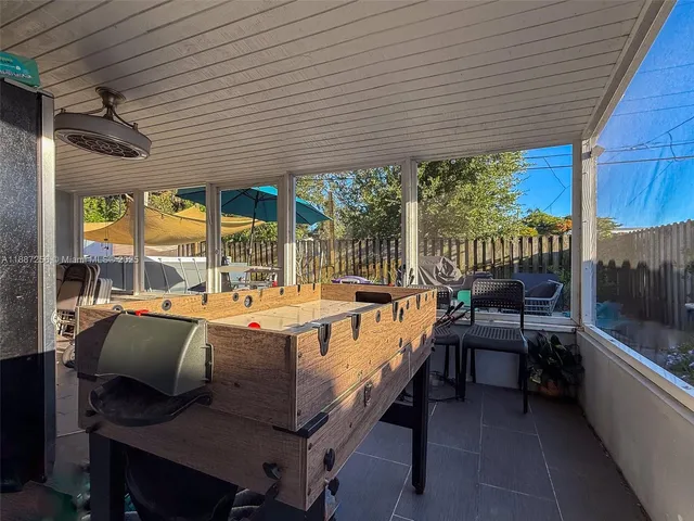 a outdoor dining space with furniture