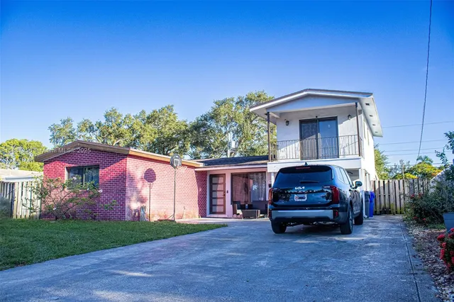 a house view with a garden space