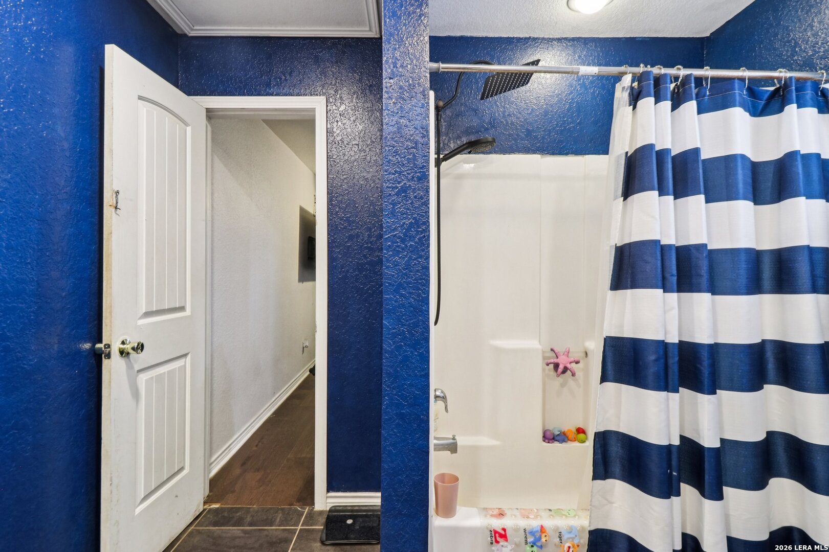 215-213 Coughran Road Pleasanton, TX 78064 - Photo 7 of 13 a bathroom with a sink and a mirror