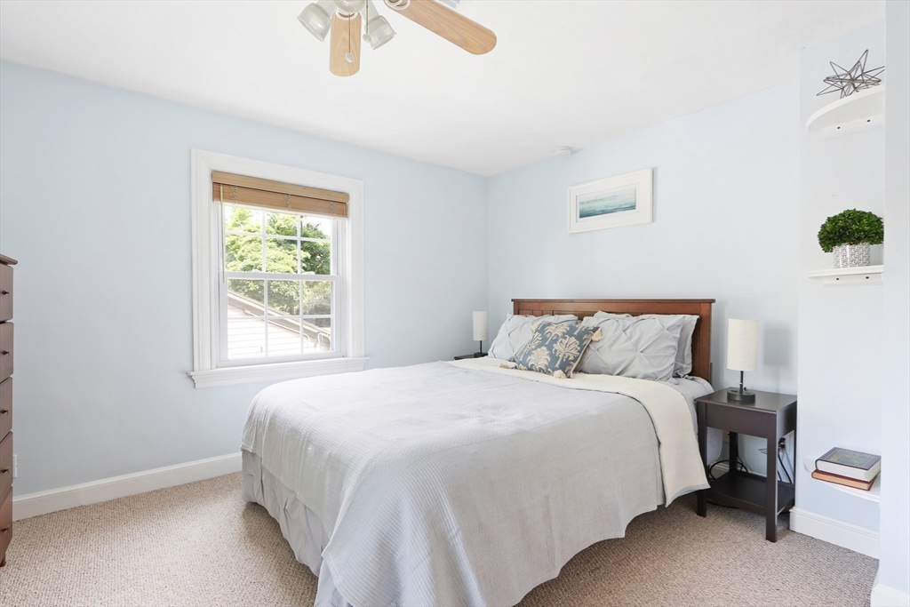 12 Haynes Road Newton, MA 02459 - Photo 18 of 27 a bedroom with a bed and a window