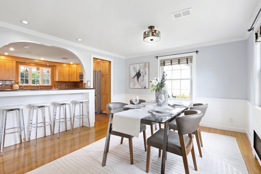 12 Haynes Road Newton, MA 02459 - Photo 3 of 27 a view of a dining room with furniture window and outside view