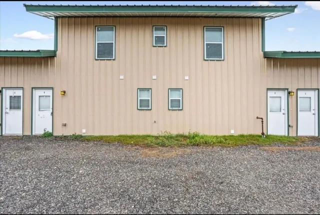 a view of backyard of house