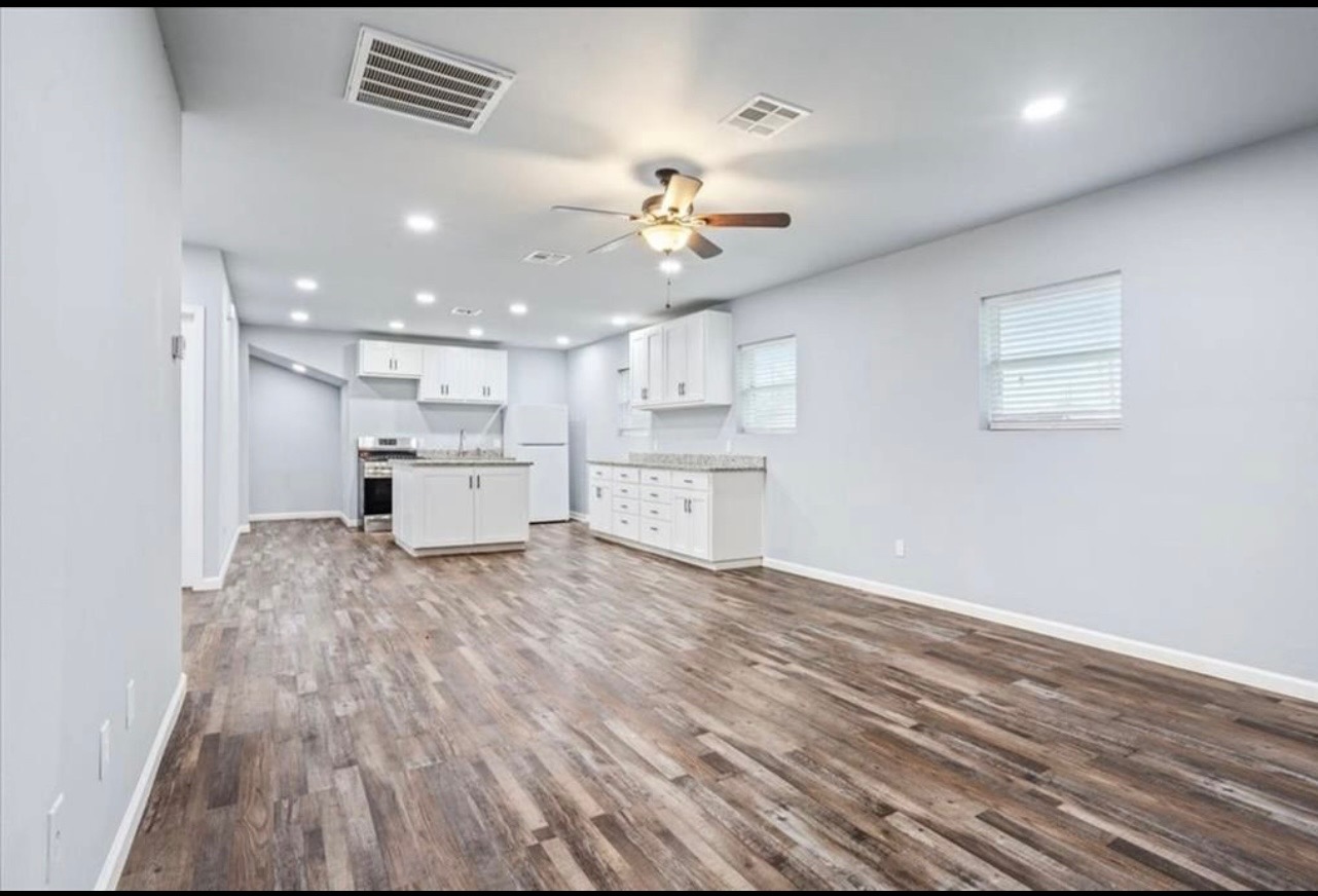 117 Emma Street, Unit B Bartlett, TX 76511 - Photo 3 of 18 a view of a kitchen with a sink and a stove