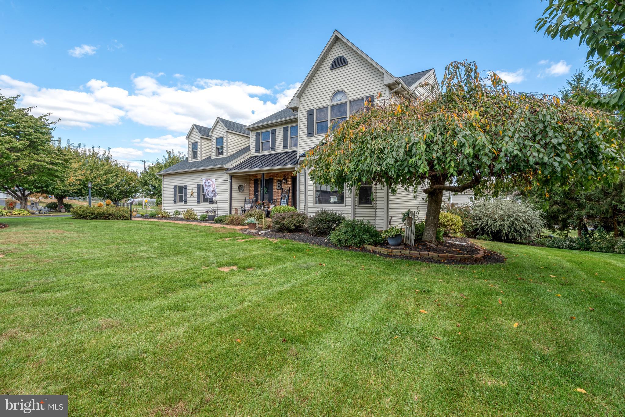 5 Village Drive Lititz, PA 17543 - Photo 52 of 62 a front view of a house with a yard