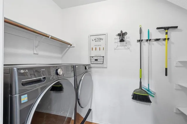 a utility room with dryer and washer