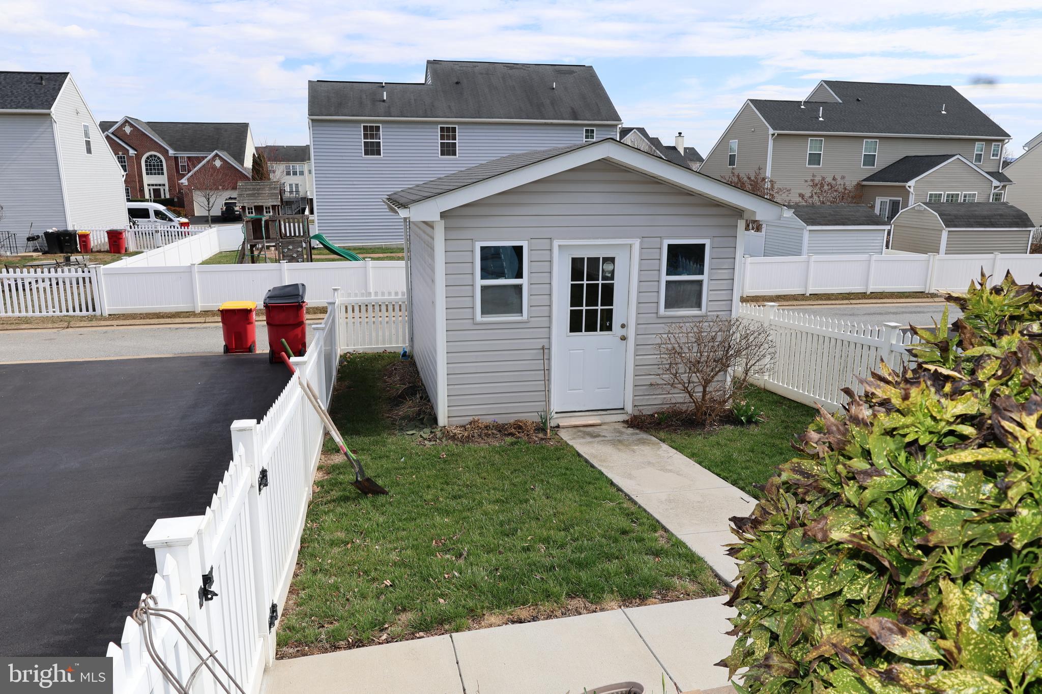 1224 North Fairfax Boulevard Ranson, WV 25438 - Photo 31 of 38 a aerial view of a house with a yard