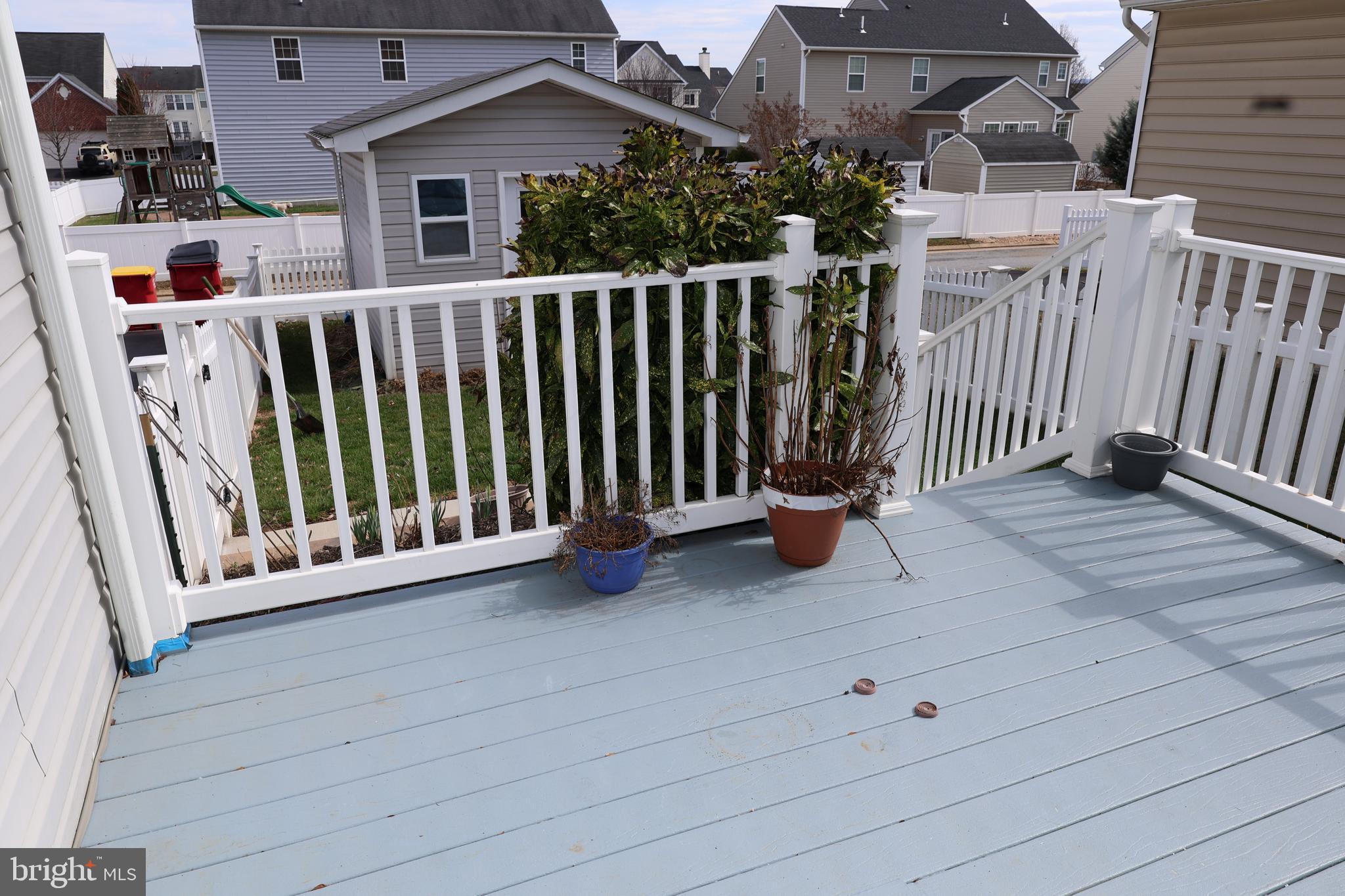 1224 North Fairfax Boulevard Ranson, WV 25438 - Photo 32 of 38 a view of a porch with wooden floor and fence