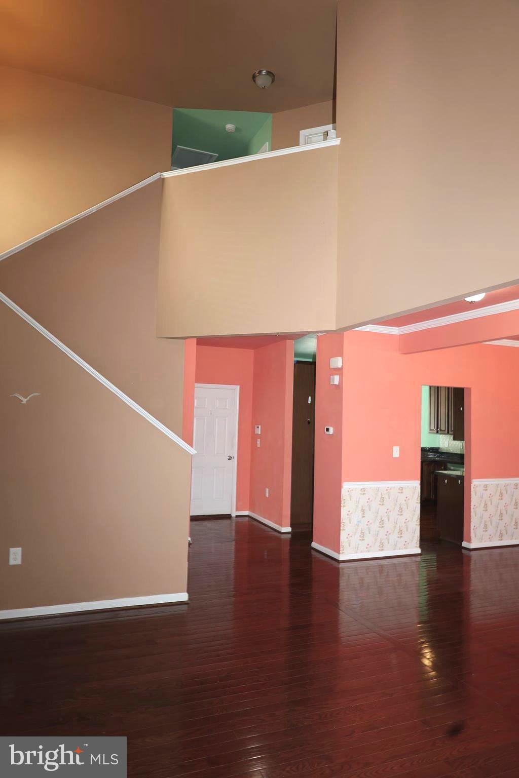 1224 North Fairfax Boulevard Ranson, WV 25438 - Photo 7 of 38 a view of an empty room with wooden floor