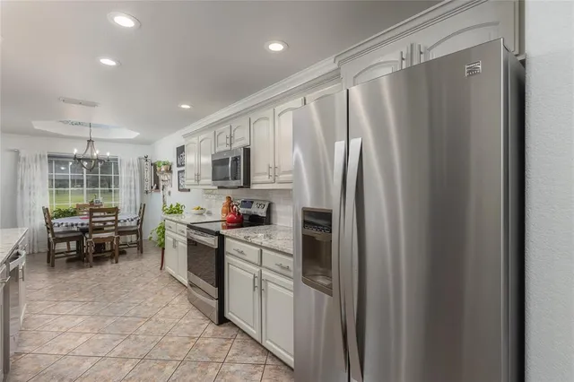 a bathroom with a tub shower and sink