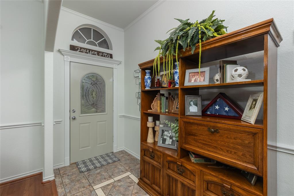 510 Highland Road Springtown, TX 76082 - Photo 7 of 40 a view of an entryway with wooden floor