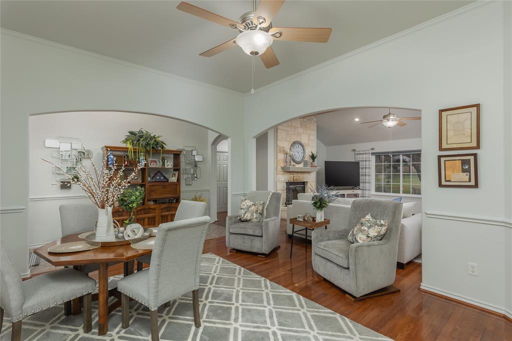510 Highland Road Springtown, TX 76082 - Photo 8 of 40 a living room with furniture and wooden floor